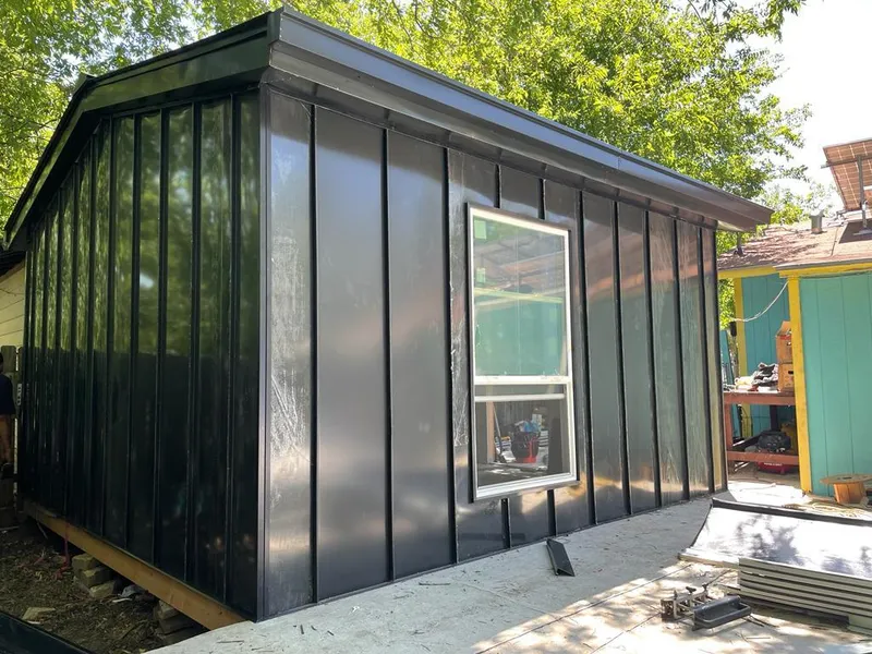 Black standing seam metal wall panels for Metal Roof Installation in Collinsville